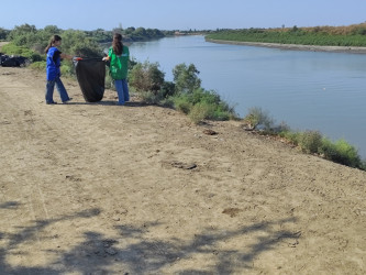 Neftçala rayonunda Kür çayı sahilində növbəti təmizlik aksiyası keçirilib